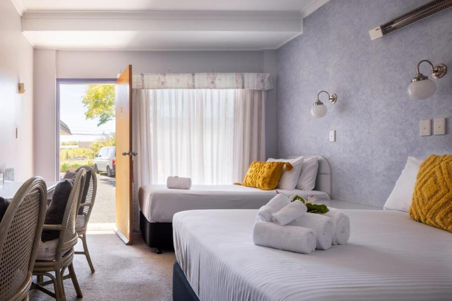 South Pacific Palms Motor Inn ทันเคอร์รี ภายนอก รูปภาพ